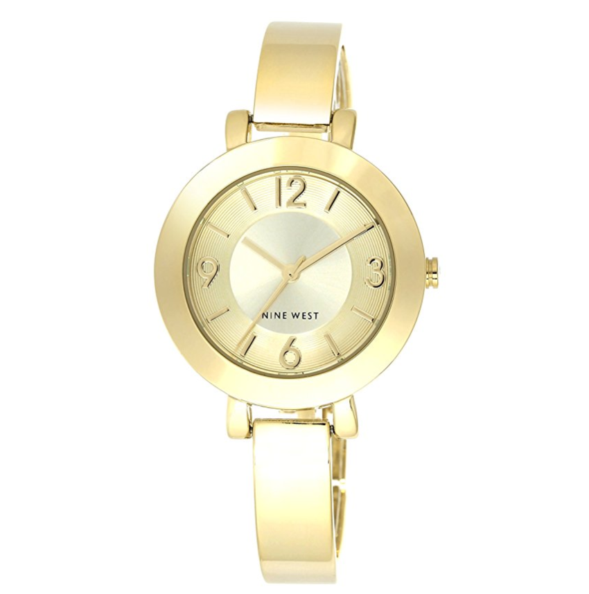 Nine West Women's NW/1630CHGB Champagne Dial Gold-Tone Bangle Watch only $30.20