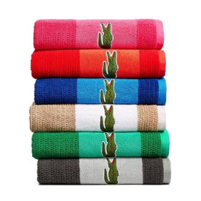 Macys.com offers the Lacoste Match Cotton Colorblocked Bath Towel for $12.99.