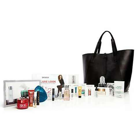 Up To $700 Gift Card Beauty Gift Card Event + Tote filled with travel-size samples @ Saks Fifth Avenue